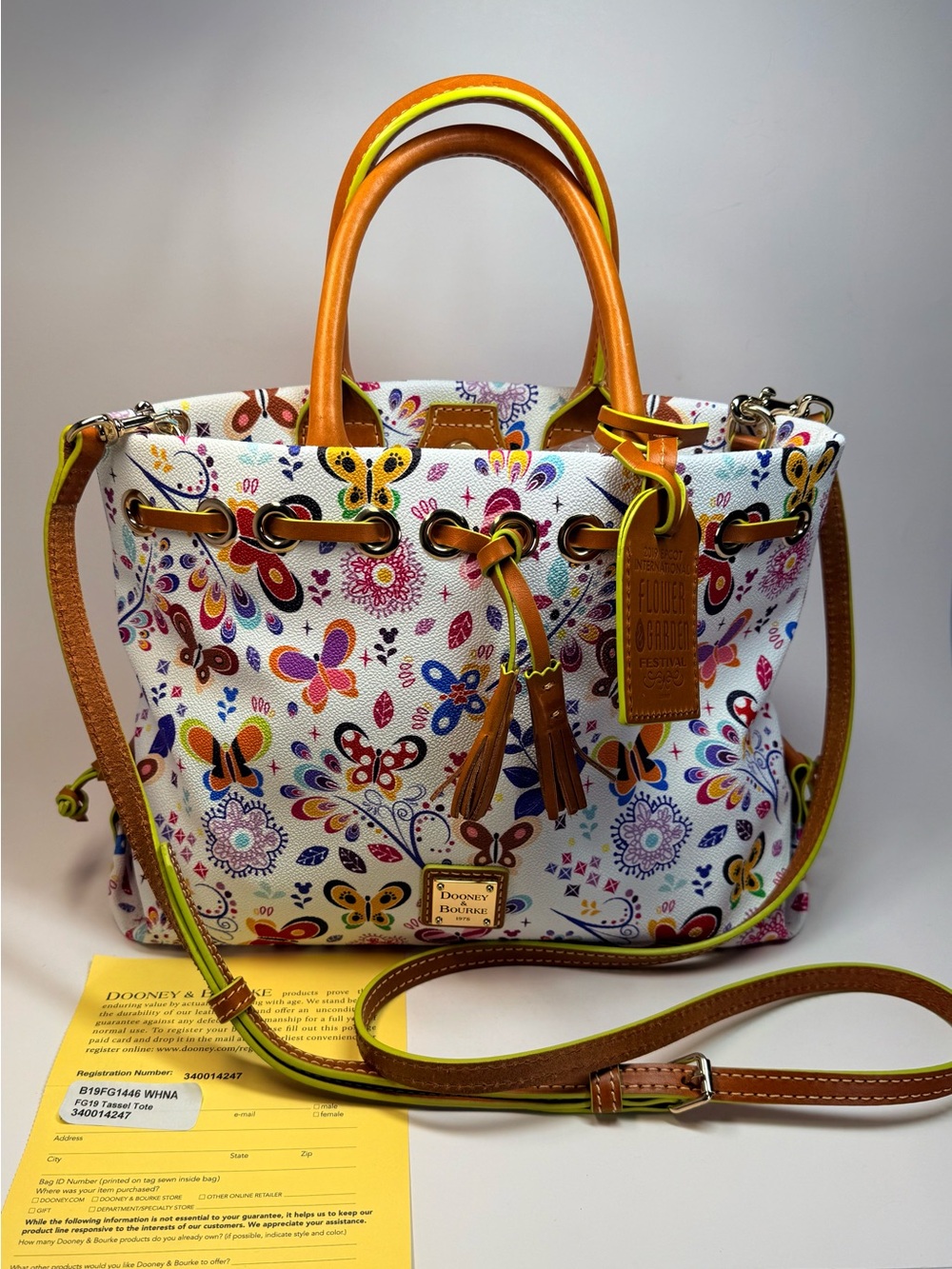 Dooney & Bourke White Floral Butterflies Tote 2019  Passholder tote bag purse.